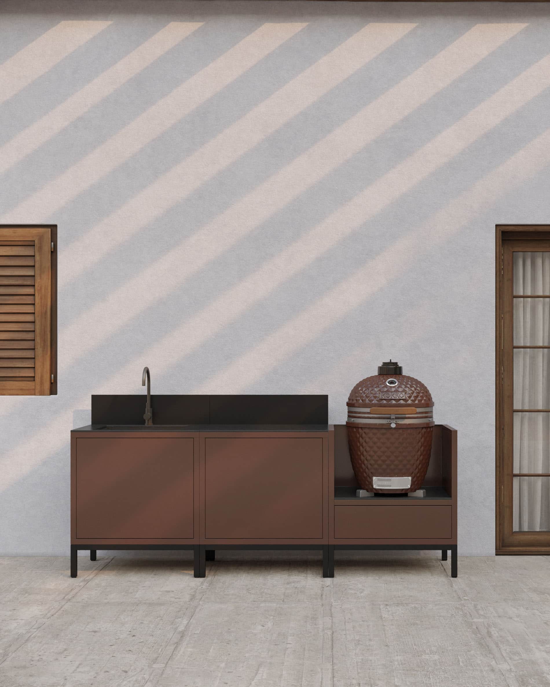 Buitenkeuken op palen in roestkleurige afwerking met geïntegreerde spoelbak, donker werkblad, bijpassende achterwand en speciaal kamado-module op verhoogde structuur.